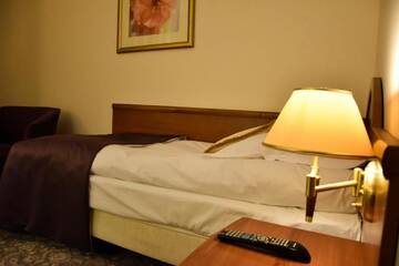 Фото номера Одноместный номер Отель Hotel Amaryllis г. Сважендз 3